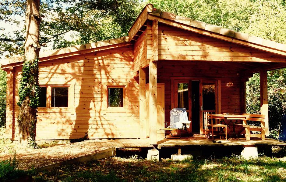 chalet bois en foret